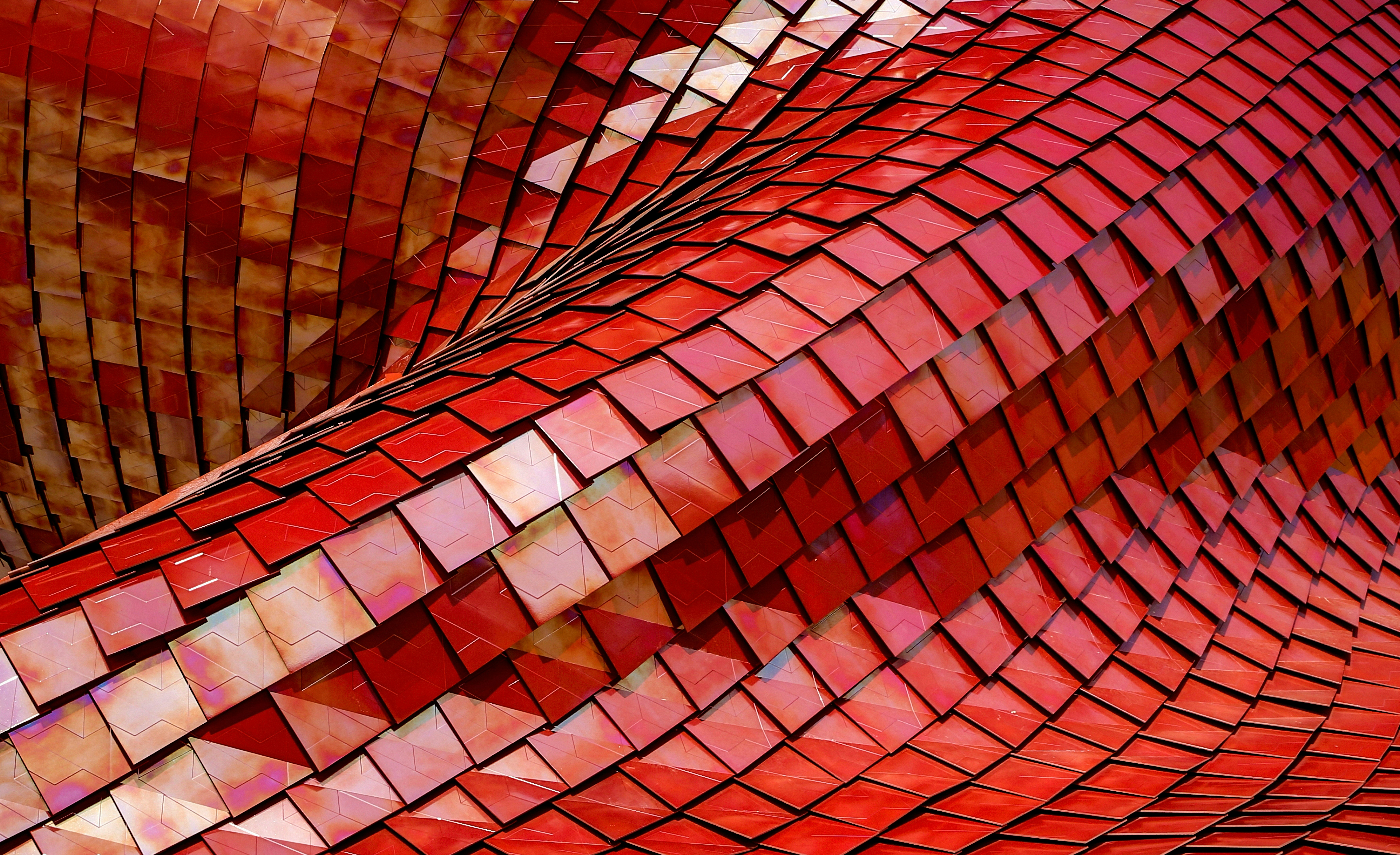 Red roof metal shiny unsplash photo of Ricardo Gomez Angel